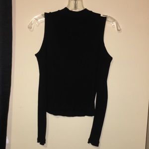 Black cropped turtle neck with shoulder cutouts